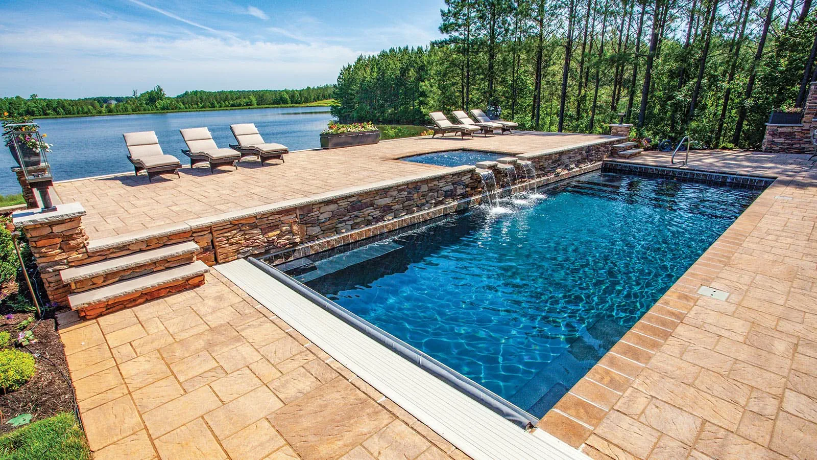 A Leisure Pools outdoor swimming pool in Ebony Blue color